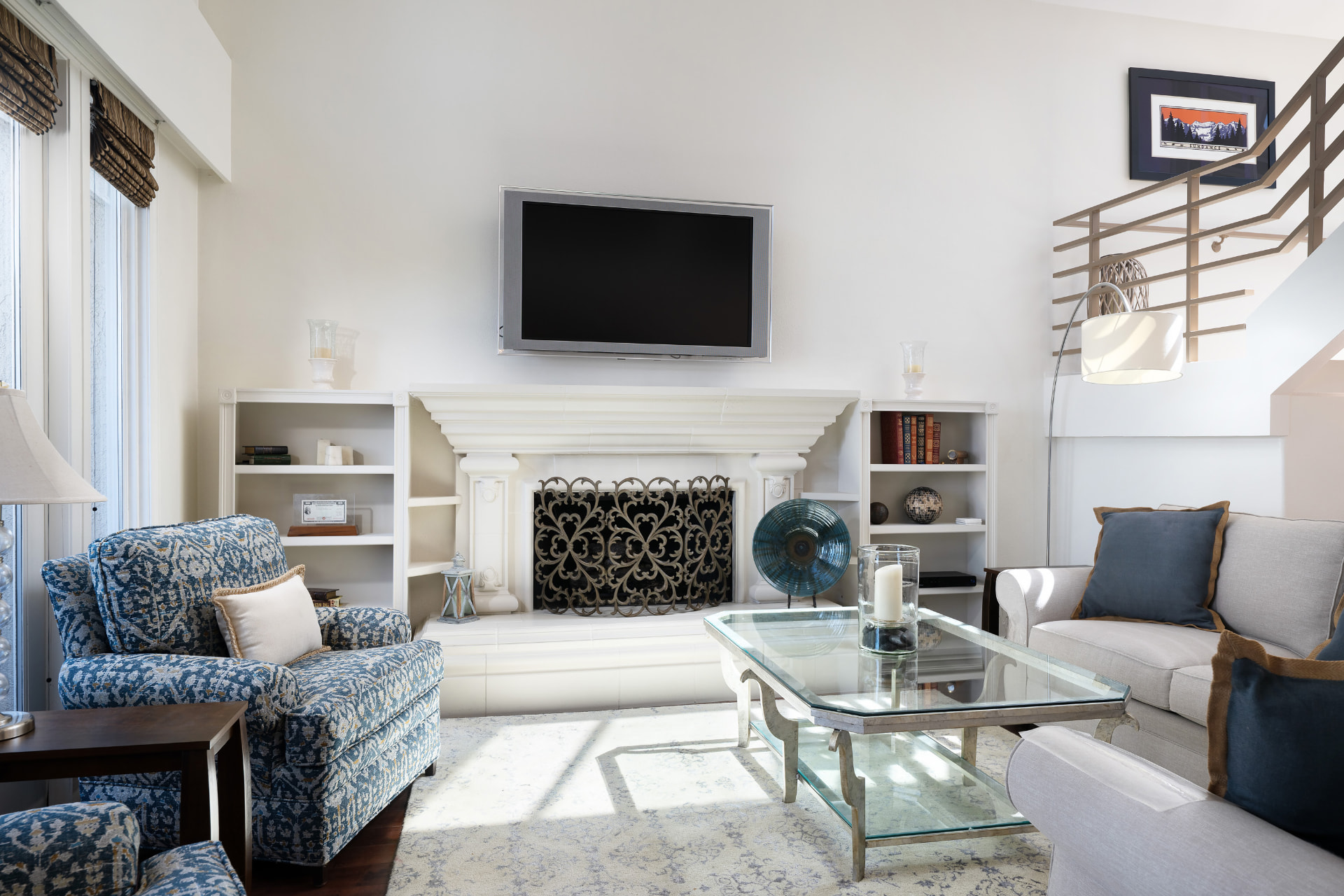 Living room fireplace with built-in shelving